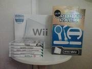 Nintendo Wii with 2 controllers,  2 nun-chucks,  6 games and extras
