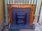 coal effect gas fire, solid wood surround and granite hearth