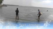 Splashing through the lake Chivero,  Harare,  Zimbabwe